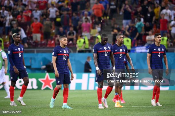 Paul Pogba, Kylian Mbappe, Moussa Sissoko, Presnel Kimpembe and Raphael Varane of France look dejected after the second half of extra time in the...