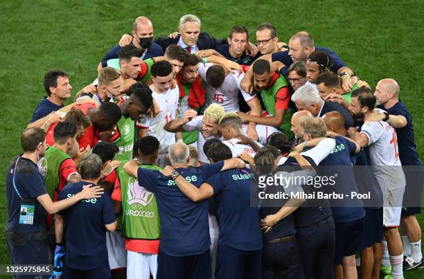 Granit Xhaka of Switzerland encourages the team before the penalty shoot out in the UEFA Euro 2020 Championship Round of 16 match between France and...