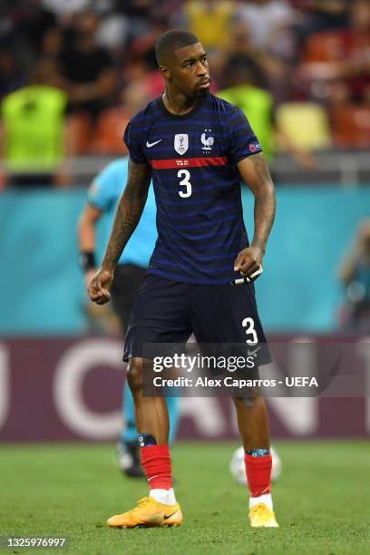 Presnel Kimpembe of France celebrates scoring their team's fourth penalty in the penalty shoot out during the UEFA Euro 2020 Championship Round of 16...