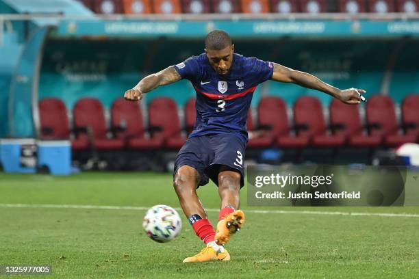 Presnel Kimpembe of France scores their team's fourth penalty in the penalty shoot out during the UEFA Euro 2020 Championship Round of 16 match...