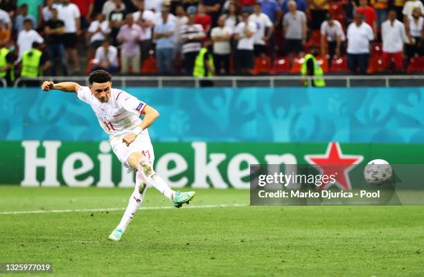 Ruben Vargas of Switzerland scores their team's fourth penalty in a penalty shoot out during the UEFA Euro 2020 Championship Round of 16 match...