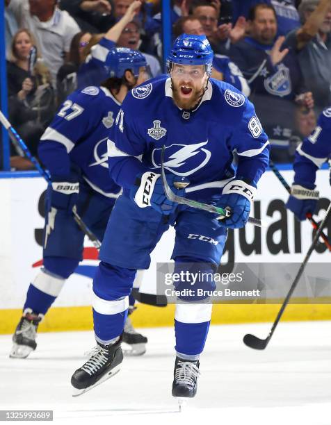 Erik Cernak of the Tampa Bay Lightning celebrates after scoring a goal against the Montreal Canadiens during the first period in Game One of the 2021...