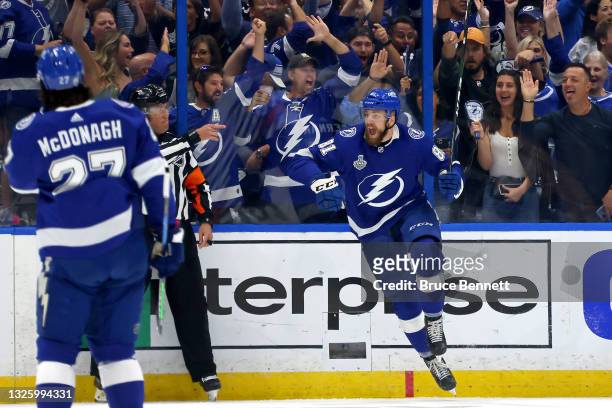 Erik Cernak of the Tampa Bay Lightning celebrates after scoring a goal against the Montreal Canadiens during the first period in Game One of the 2021...