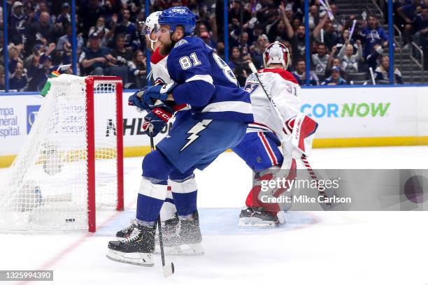 Erik Cernak of the Tampa Bay Lightning scores a goal past Carey Price of the Montreal Canadiens during the first period in Game One of the 2021 NHL...