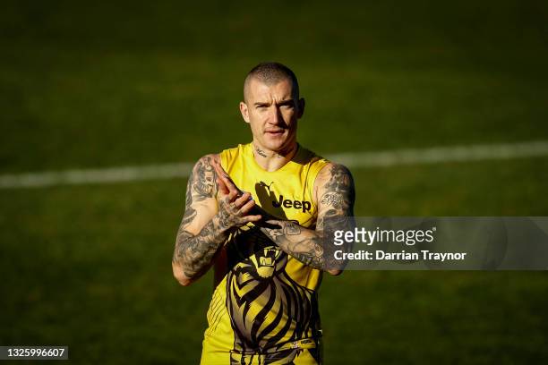 Dustin Martin of the Tigers looks on during a Richmond Tigers AFL training session at Punt Road Oval on June 29, 2021 in Melbourne, Australia.