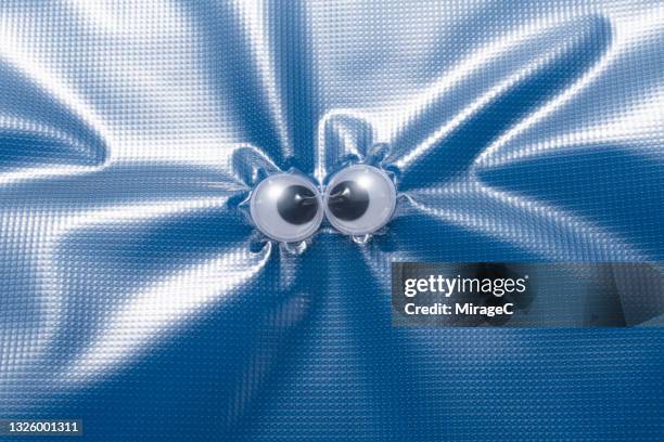 panicked googly eyes suffocated in a plastic bag - google eyes stock pictures, royalty-free photos & images