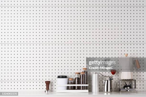 coffee corner on white pegboard wall - multi tool stock pictures, royalty-free photos & images