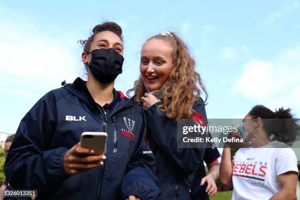 Kelera Ratu of the Rebels and Sarah Hogan of the Rebels react during a Melbourne Rebels Super W team event at The Big Banana Fun Park on June 27,...