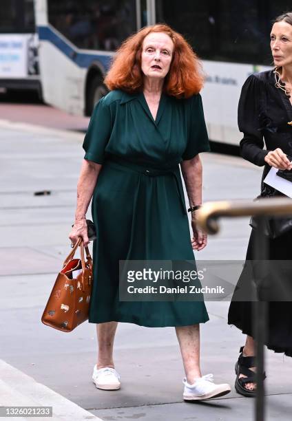 Grace Coddington is seen wearing a forest green dress with tan cat print bag outside the Marc Jacobs show on June 28, 2021 in New York City.