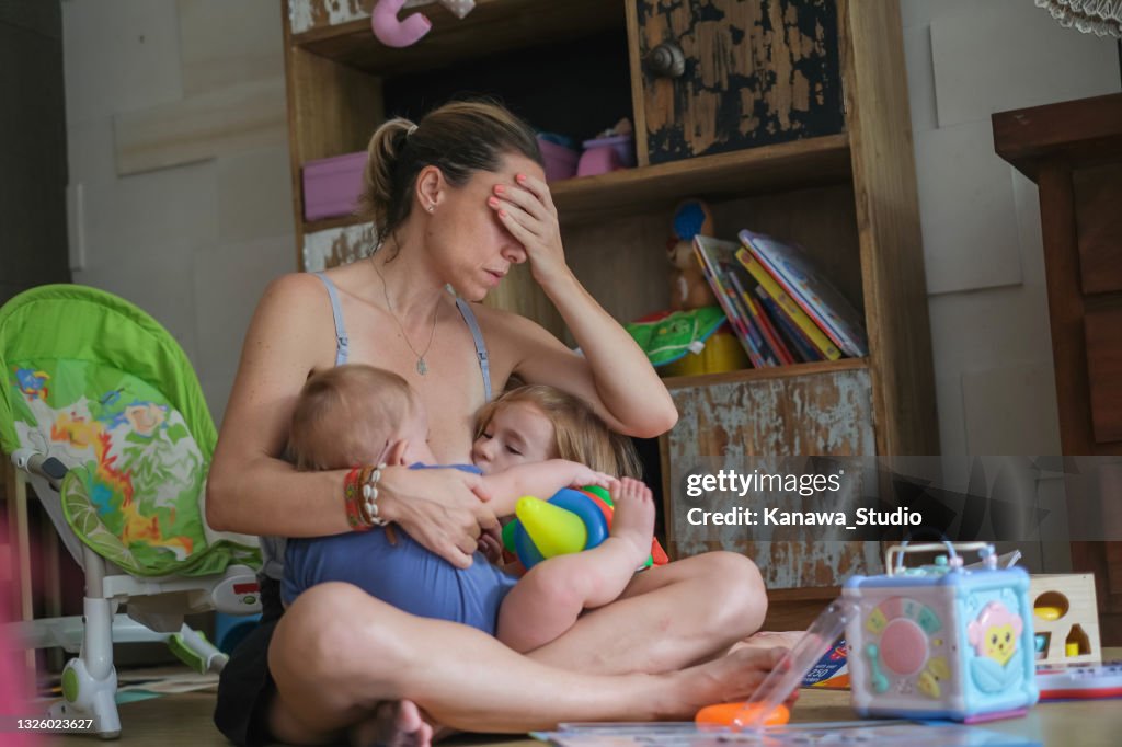 Toddler Breastfeeding Two Babies Tired Mother Tandem Nursing Her