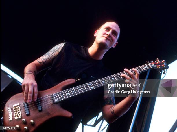 Bassist P-Nut performs live with his band 311 at the Vans Warped Tour concert June 22, 2001 at Peoria Sports Complex in Phoenix, AZ. (Photo by Gary...