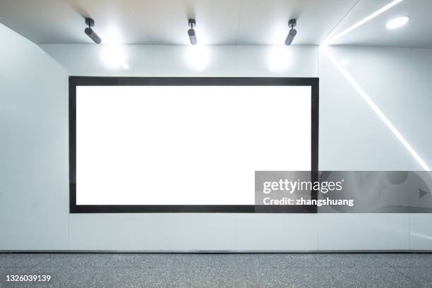 subway advertising light box - subway platform poster stock pictures, royalty-free photos & images