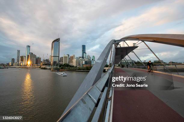 Cyclist travels along Southbank on June 29, 2021 in Brisbane, Australia. Queensland Premier Annastacia Palaszczuk has announced a three-day lockdown...