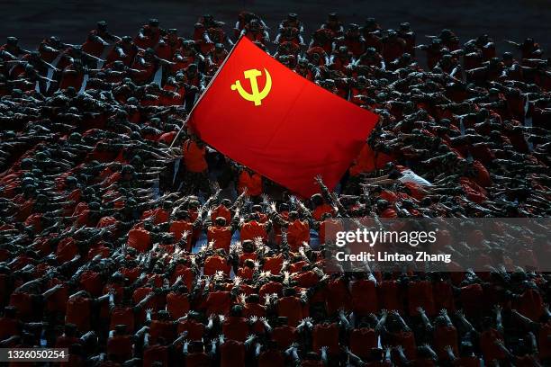 Actors perform to celebrate the 100th anniversary of the founding of the Communist Party of China at Birds Nest on June 28, 2021 in Beijing, China.