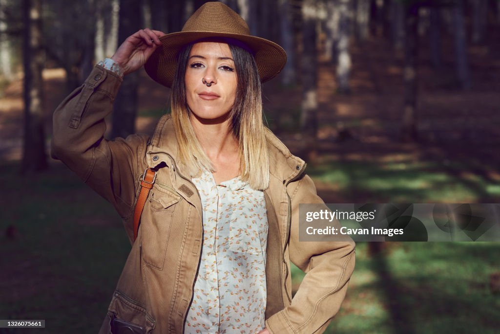 Timber Ridge Woman Woman On The Mountain She Is In A Forest With Pine Trees High-Res Stock ...