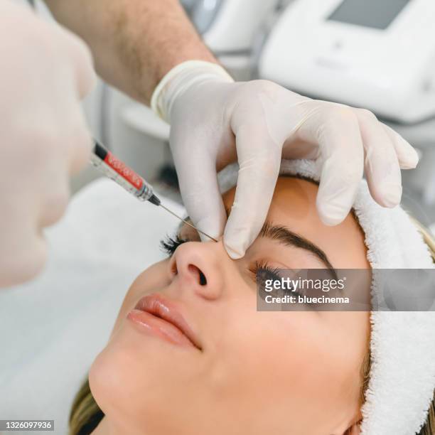 beauty treatment with botox - plastic surgery stockfoto's en -beelden
