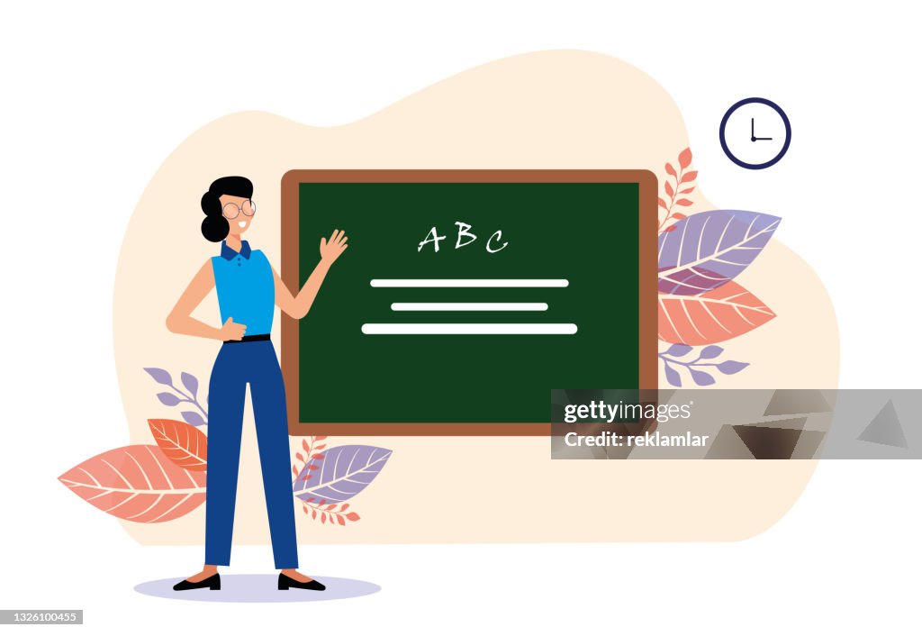 Young Female Teacher Showing The Blackboard In The Classroom There Are  Letters On The Classroom Board Elementary School Teacher Young Woman  Standing School Classroom Interior Education Concept Cartoon Vector  Illustration Back To