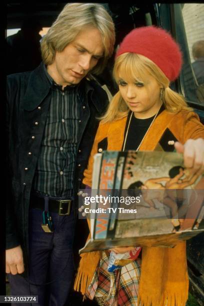 Actors Adam Faith and Adrienne Posta in character as Ronald Bird and Charity on the set of drama series Budgie, circa 1971.