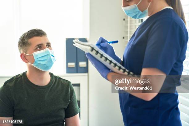 Interview Mask Doctor Interview Mask Photos and Premium High Res Pictures - Getty Images