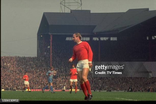 Bobby Charlton on the pitch during a match between Manchester United and West Ham United at Old Trafford stadium, on September 7, 1968.