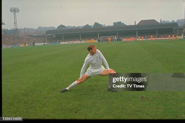 Leeds United F.C. Defender Jack Charlton warming up before a match, likely against Wolverhampton Wanderers, circa 1968.