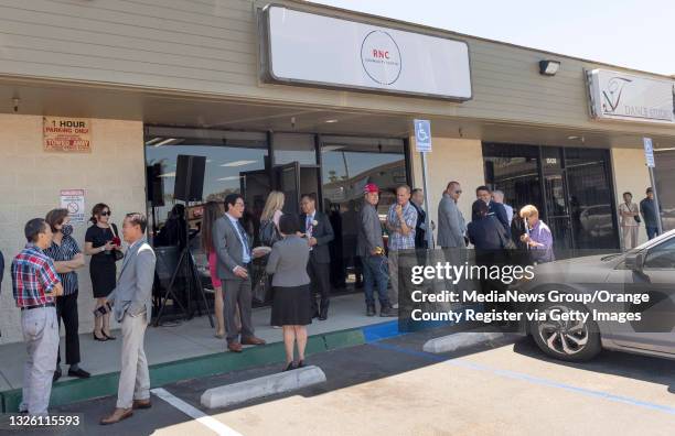 Westminster, CA People gather outside during the opening of an Asian Pacific American Community Center in Westminster, CA on Friday, June 25, 2021....