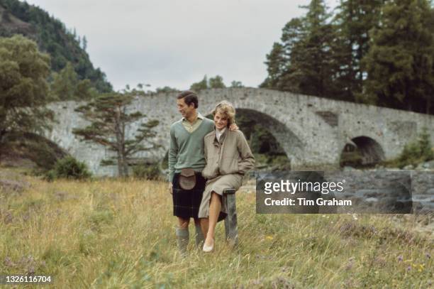 Prince Charles and Diana, Princess of Wales walking by the River Dee at the end of their honeymoon at Balmoral, Scotland, 19th August 1981. Diana is...
