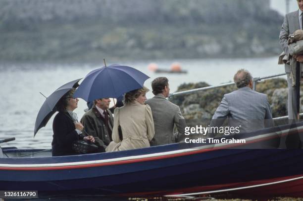 Diana, Princess of Wales and Prince Charles in Castlebay on the island of Barra, in the Outer Hebrides of Scotland, 3rd July 1985. Kisimul Castle is...