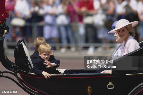 Diana, Princess of Wales in a carriage with her sons Prince William and Prince Harry, and Queen Elizabeth the Queen Mother , outside Buckingham...