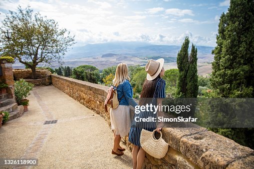 Tourist women admiring the view Tourist women admiring the view