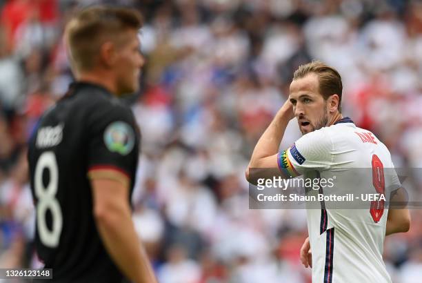 Harry Kane of England looks on wearing a rainbow captains armband during the UEFA Euro 2020 Championship Round of 16 match between England and...