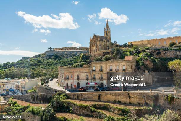 scenic view of famous historic church in town gozo, malta - gozo malta stock pictures, royalty-free photos & images