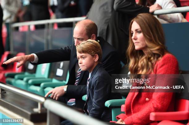 Prince William, President of the Football Association along with Catherine, Duchess of Cambridge with Prince George during the UEFA Euro 2020...
