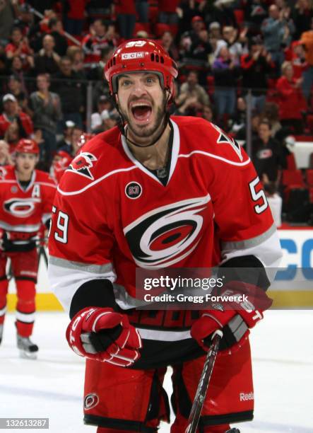 Chad LaRose of the Carolina Hurricanes skates back to the bench after scoring a third period goal during a NHL game against the Pittsburgh Penguins...