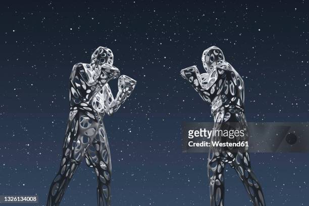 three dimensional render of two wireframe men preparing to fight against starry sky at night - boxing stock-grafiken, -clipart, -cartoons und -symbole