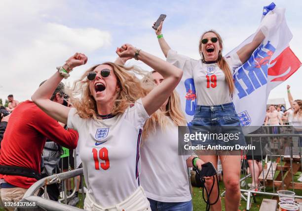 Supporters celebrate the second England goal at the 4TheFans Fan Park at Event City on June 29, 2021 in Manchester, United Kingdom on June 29, 2021...