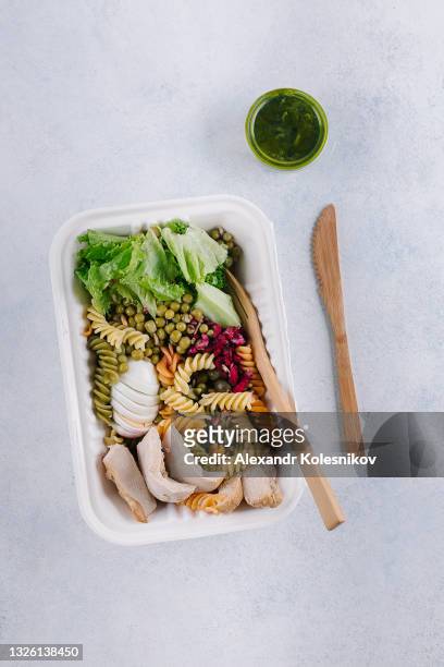 healthy salad in recycled bowl. concept of food delivery, quarantine, take out food - kazakhstan coronavirus stock pictures, royalty-free photos & images