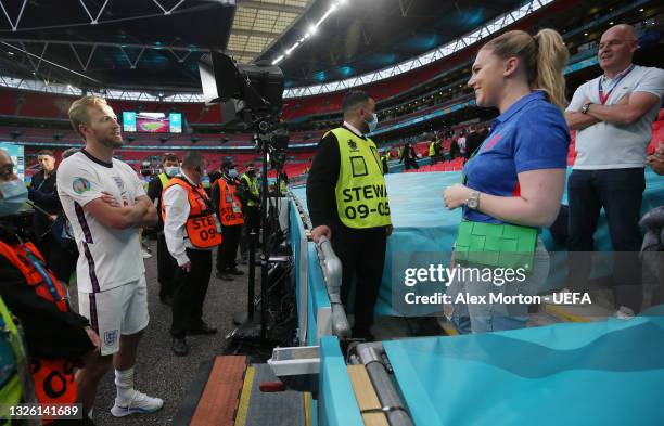 Harry Kane of England speaks with his Wife, Katie Goodland following the UEFA Euro 2020 Championship Round of 16 match between England and Germany at...