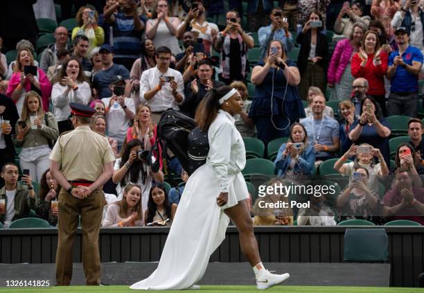 Serena Williams of The United States walks onto centre court ahead of her Ladies' Singles First Round match against Aliaksandra Sasnovich of Belarus...