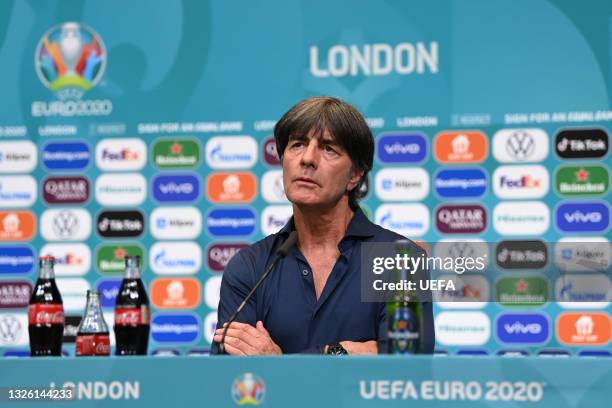 In this handout picture provided by UEFA, Joachim Loew, Head Coach of Germany reacts as he speaks to the media during the Germany Press Conference...