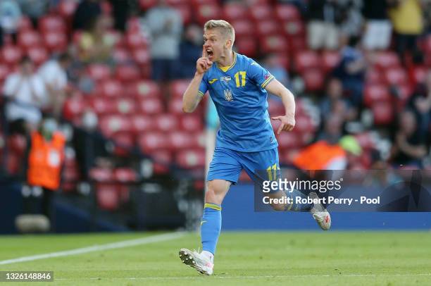Oleksandr Zinchenko of Ukraine celebrates after scoring their side's first goal during the UEFA Euro 2020 Championship Round of 16 match between...