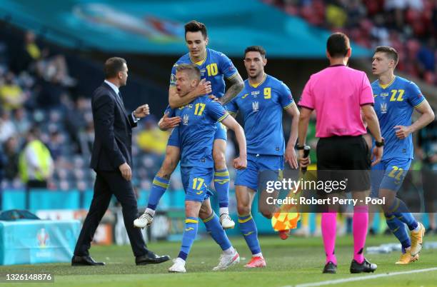 Oleksandr Zinchenko of Ukraine celebrates with Mykola Shaparenko after scoring their side's first goal during the UEFA Euro 2020 Championship Round...