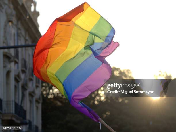 lgbt pride parade - rainbow flag stock-fotos und bilder