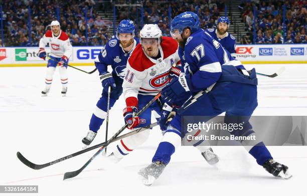 Brendan Gallagher of the Montreal Canadiens skates against the Tampa Bay Lightning during Game One of the 2021 NHL Stanley Cup Finals against the...