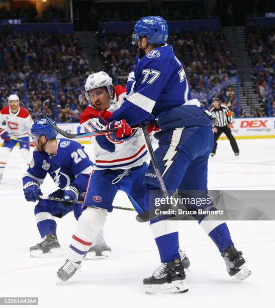 Brendan Gallagher of the Montreal Canadiens goes up against Victor Hedman of the Tampa Bay Lightning during Game One of the 2021 NHL Stanley Cup...