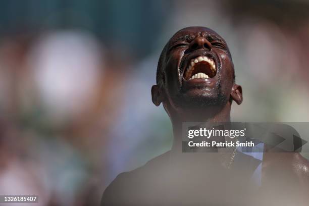 Paul Chelimo reacts after winning Men's 5,000 Meter Run during day ten of the 2020 U.S. Olympic Track & Field Team Trials at Hayward Field on June...