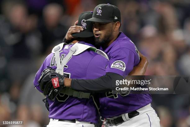 Starting pitcher Germain Marquez of the Colorado Rockies celebrates the final out with catcher Elias Diaz after throwing a one hitter against the...