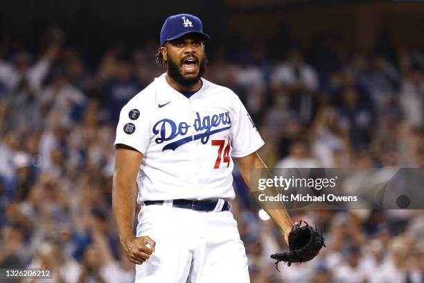 Kenley Jansen of the Los Angeles Dodgers reacts after closing out the ninth inning against the San Francisco Giants at Dodger Stadium on June 29,...