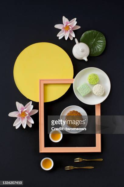 flat lay abstract mid autumn festival mooncakes and tea still life. - lotus flower studio stock pictures, royalty-free photos & images