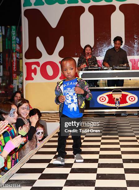 Model walks the runway at Gwen Stefani's launch of her Harajuku Mini for Target Collection at Jim Henson Studios on November 12, 2011 in Los Angeles,...